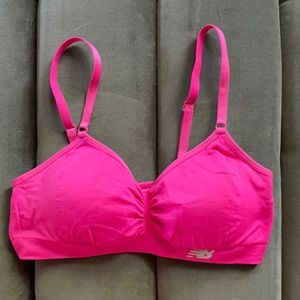 New Balance padded seamless sports bra with ruched front - neon pink size S